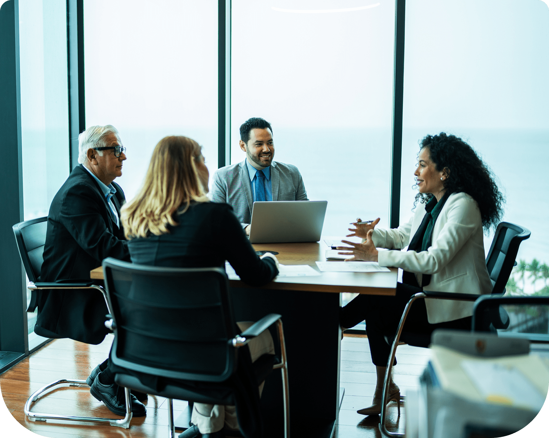 Business meeting in a modern office setting.